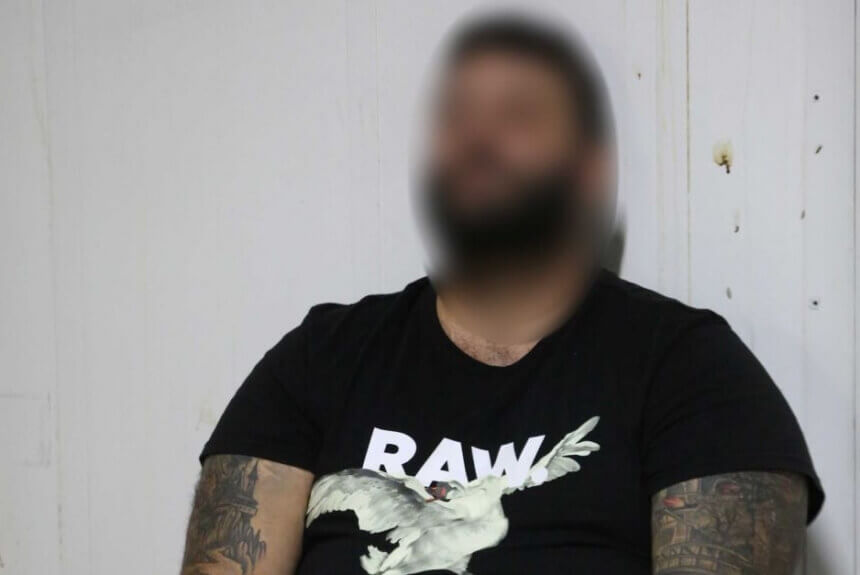 Senior Finks bikie charged after police uncover guns and $4m worth of drugs